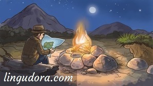It's nighttime. A man is sitting next to a campfire on a tree trunk looking at a map. In the background a mountain and a hill is shown. The dark blue sky is filled with stars and the full moon is lighting the scene.